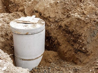 an-excavated-pit-and-concrete-rings-for-sewerage-in-it